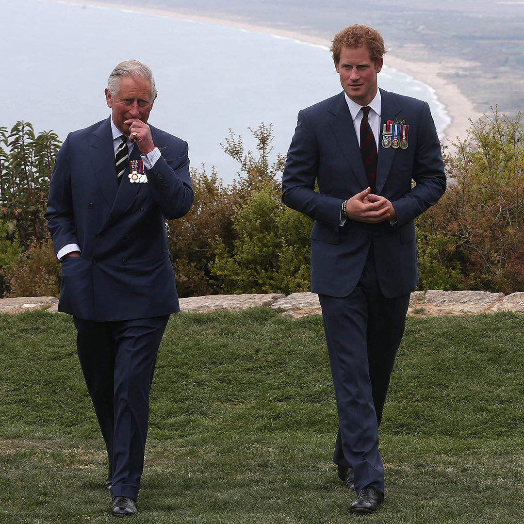 GALLIPOLI, TURKEY - APRIL 25: Prince Harry chats with Prince Charles, Prince of Wales during a visit to The Nek, a narrow stretch of ridge in the Anzac battlefield on the Gallipoli Peninsula, as part of commemorations marking the 100th anniversary of the Battle of Gallipoli on April 25, 2015 in Gallipoli,Turkey. Turkish and Allied powers representatives, as well as family members of those who served, are commemorating the 100th anniversary of the Gallipoli campaign with ceremonies at memorials across the Gallipoli Peninsula. The Gallipoli land campaign, in which a combined Allied force of British, French, Australian, New Zealand and Indian troops sought to occupy the Gallipoli Peninsula and the strategic Dardanelles Strait during World War I, began on April 25, 1915 against Turkish forces of the Ottoman Empire. The Allies, unable to advance more than a few kilometers, withdrew after eight months. The campaign cost the Allies approximately 50,000 killed and up to 200,000 wounded, the Ottomans approximately 85,000 killed and 160,000 wounded. (Photo by Niall Carson-Pool/Getty Images)