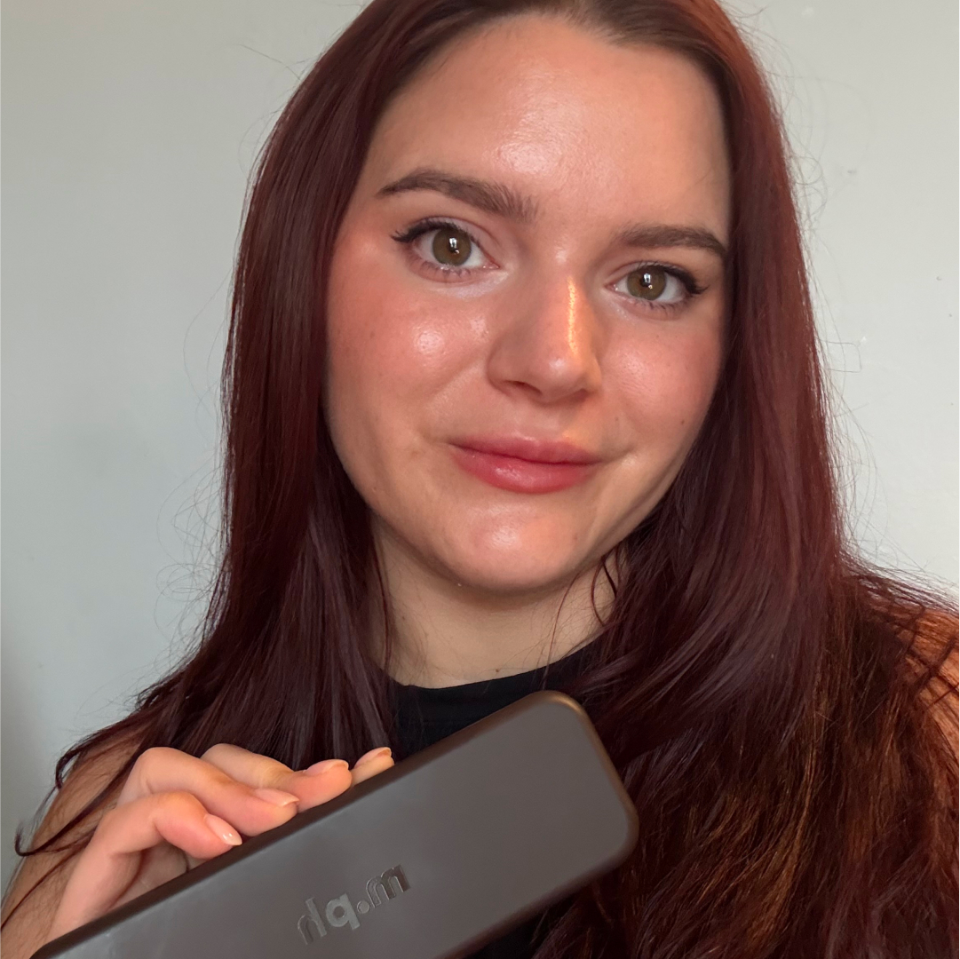 Brooke Knappenberger holding up m.ph. underpainting palette